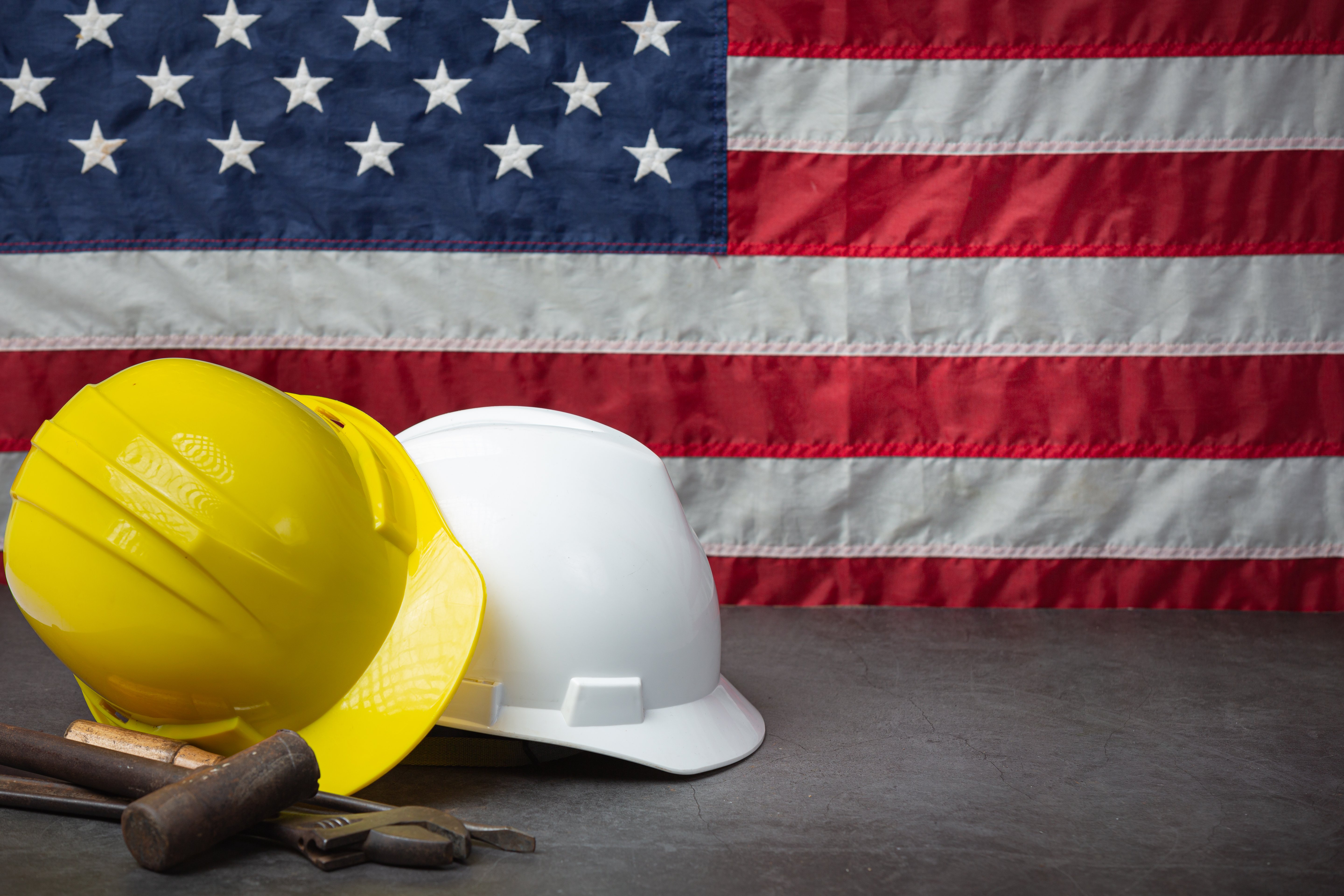 american-flag-tools-near-helmet-labor-day-concept-1
