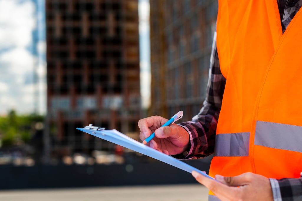 close-up-construction-engineer-writing