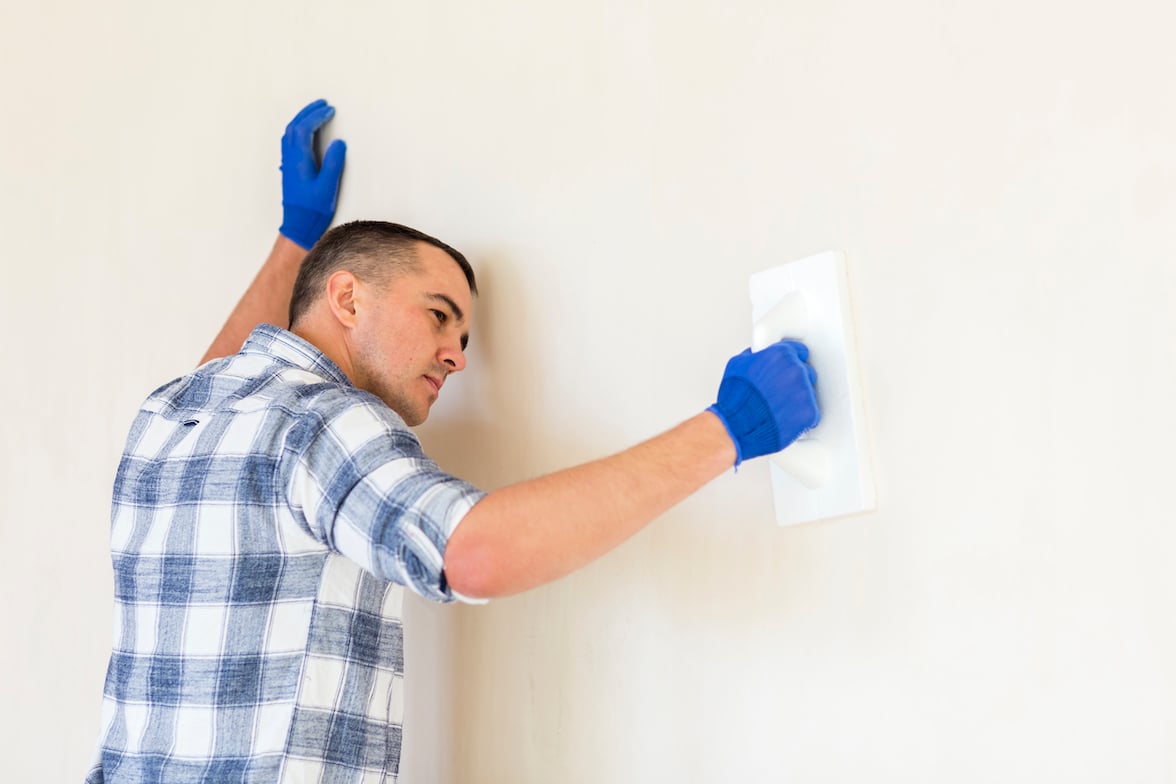 front-view-man-working-wall-1