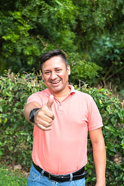 latino-businessman-smiling-looking-camera